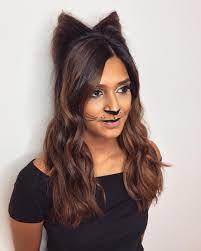 This is my way of creating cat ears using your own hair! 19 Halloween Hairstyles That Double As Easy Costume Ideas Allure