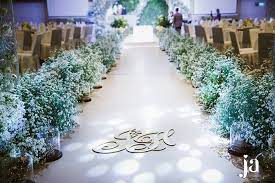 The Aisle Was Decorated By Thousand Of Little Cutie Aster Flowers With Their Pure White Tr Wedding Aisle Decorations Enchanted Forest Wedding Wedding Flowers