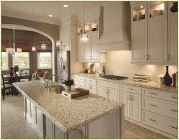 Image Result For Snowfall Granite With Green Tint Backsplash Combinations Kitchen Cabinets And Granite Beige Kitchen Kitchen Renovation