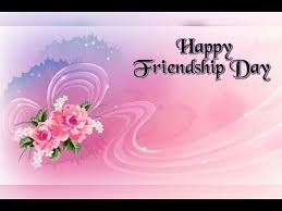 Happy friendship day message greeting across white flower tags hanging from pegs on a line. Happy Friendship Day Youtube