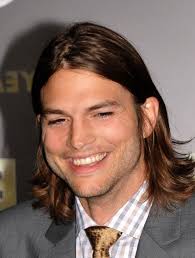 Cool Haircuts For Men Ashton Kutcher Brown Hair Grey Blazer Checkered Shirt Gold Tie Long Hair Styles Men Mens Hairstyles Long Hair Styles