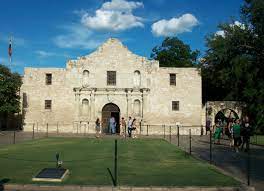 From inside the airport, follow the rental car signs across the sky bridge to the alamo rental counter. Alamo Plaza