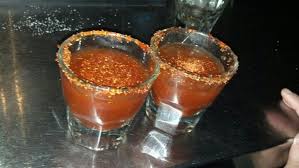Turn coated gummies out onto a baking sheet lined with aluminum foil and sprinkle evenly with 1 tablespoon of tajín. Chamoy Pickle Shots