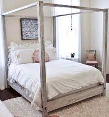 Patterned sheets or pillows also pair nicely with the. Twin Distressed Wooden Canopy Bed From Reclaimed By Sameasnever 599 00 Wooden Canopy Bed Wood Canopy Bed White Bedroom Furniture