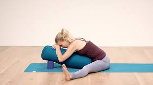Wide Angle Seated Forward Bend Upavistha Konasana With A Bolster Forward Bend Yoga For Flexibility Wide Angle