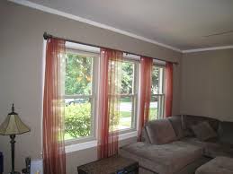Panels frame your windows to allow natural light to stream in. 3 Windows In A Row Ideas For Window Treatments Large Windows Living Room Window Treatments Living Room Living Room Windows
