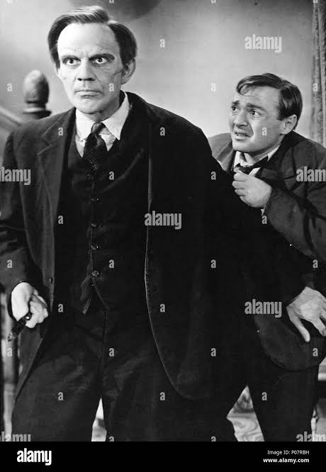 Original Film Title: ARSENIC AND OLD LACE. English Title: ARSENIC AND OLD  LACE. Film Director: FRANK CAPRA. Year: 1944. Stars: PETER LORRE; RAYMOND  MASSEY. Credit: WARNER BROTHERS / Album Stock Photo - Alamy