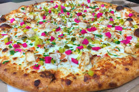 What do people eat in the us except fast food. Pizza Shop In California Serves Lebanese Garlic Chicken Pizza