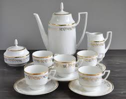 The mark of the crossed hammers is the pirkenhammer symbol. Pirkenhammer Porcelain Coffee Set By Jaroslav Jezek Louisa Design Porcelain Coffee Pot Porcelain Coffee Cup Tea Cup And Saucer Set Cups Coffee Set Cup And Saucer Set Porcelain