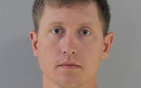 Township Trustee charged with recording juvenile while in bathroom