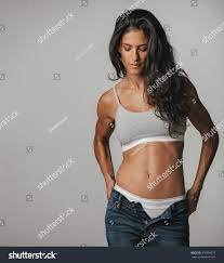 Fit Young Woman Pulling Down Pants Stock Photo 470366879 | Shutterstock