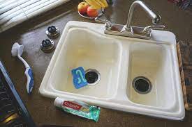 Work the baking soda into the stain with a strong sponge, then spray it with white vinegar. Clean Up Old Rv Plastic Sinks With Toothpaste