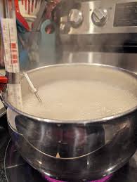 How to prevent foam overflow when boiling maple sap?