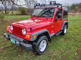 Image result for Flame Red 2005 Jeep