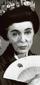 Nancy Kulp (Miss Jane) in a two piece bathing suit looking seductive.