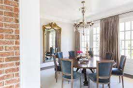 French country style decor is a popular way to decorate, these days. French Dining Room With Round Dining Table And Blue Velvet French Dining Chairs French Dining Room