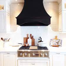 The space appears larger with high cabinets, bright lights. Pin By Shannon Bradfield On Kitchen Kitchen Range Hood White Kitchen Range Black Kitchens