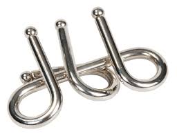 One of the rings connects the two loops and can't be removed from the frame. Metal Brain Teaser Double Loop Big Fridolin