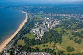 Abertawe abɛrˈtawɛ) is a coastal city and county, officially known as the city and county of swansea (welsh: Campus From The Air Looking South Along Swansea Bay To Mumbles Swansea Swansea Wales Swansea Bay