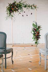 Asymmetric Trellis Option Flowers Placed On One Corner And Midway Down The Opposite Side This Is An Wedding Arch Flowers Unique Wedding Flowers Wedding Arch