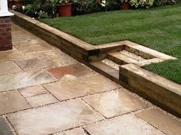 But the downside with railway sleepers is the oil and tar used to preserve them making them unsuitable for sitting on or contacting with bare skin, especially if you suffer from allergies. Garden Sleepers Ideas Garden Retaining Wall Ideas Wooden Railway Sleepers Steps Sloped Garden Landscaping Retaining Walls Sleepers In Garden