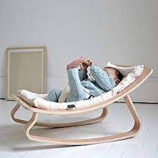 Charlie Crane Levo Baby Rocker Made Of High Quality Walnut Wood With A Soft White Cushion Cover The Children S Bou Baby Rocker Baby Rocking Chair Baby Bouncer