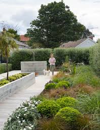 Nurse Turned Landscape Designer Builds A Garden For Family Birds And Bees Landscape Design Drought Tolerant Garden Landscape