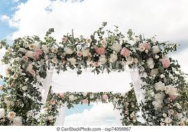 Cascading fountains are both picturesque and romantic, and are lovely additions while your wedding ceremony and reception will take place at defined locations, help set the romantic mood by decorating how guests will reach those. A Festive Chuppah Decorated With Fresh Beautiful Flowers For An Outdoor Wedding Ceremony Canstock