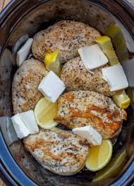 Slow Cooker Creamy Lemon Chicken With Butter Garlic And Lemon Coating Tender Chicken Breas Slow Cooker Lemon Chicken Chicken Crockpot Recipes Crockpot Recipes