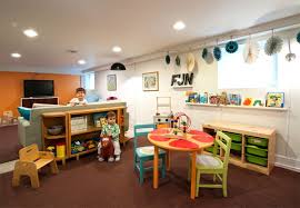The colorful playroom shows you how to build a study room with just a few desks and some colorful pictures. Basement Renovations For Kids Room Ideas Homemydesign Kids Basement Basement Decor Basement Design