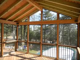 screen porches bring outdoor living into the night screened porch designs porch design porch flooring