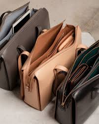 How much liquid can you take on a plane? 30 Chic Bags That Are Big Enough To Carry Your Laptop Work Bags Chic Laptop Bag Laptop Bag For Women
