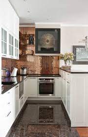 Glass gray tiles add a nice texture to the backsplash while metal and copper tiles shining out. 39 Trendy And Chic Copper Kitchen Backsplashes Digsdigs
