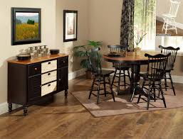 Features versatile seating with 1 bench and 4 features versatile seating with 1 bench and 4 chairs with black upholstered seats and curved paneled backs. Two Toned Ogle Furniture