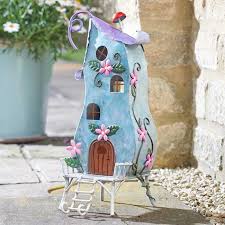 Flying pixie fairy sprinkling sparkles with a magic wand and isolated spot for text. Pixie House For Sale Online In Ireland Next Day Delivery