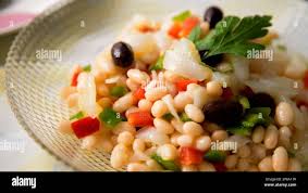 Black green olive spring onion salad hi-res stock photography and images