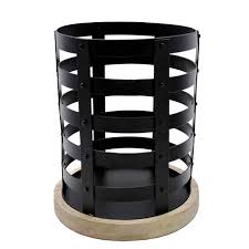 Group a few sconces together on the wall or style pillars and plates in a corner for soft lighting in your reading nook. Matt Black Candle Holder With Wooden Base For Diwali Decorations Buy Candle Holder Pillar With Wood Base Candle Holder With Wood Base Black Metal Candle Holder Product On Alibaba Com