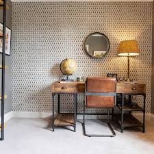 A home office with a mirror placed to improve sightlines