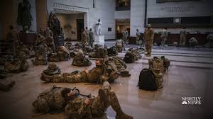 Supporters of president donald trump climb up the side of the capitol to enter in protest.credit.jason andrew for the new york times. National Guard Troops Called To The Capitol To Boost Security