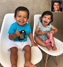Georgina rodriguez shows off huge ring and poses in silk gown on new year's eve. Cristiano Ronaldo Shares Smiley Second Birthday Snap Of His Twins People Com