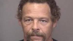 Trial begins for father and son charged with beating dog to death