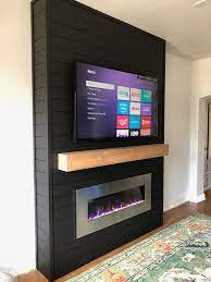 Next, you can see the cabinets starting to take shape here, and the back of the wall that would run up from the mantle. Diy Electric Fireplace Build