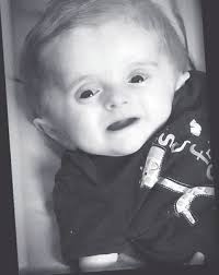 Shoots, kills girlfriend's son at poolside