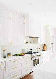 A White Kitchen With Marble Countertops Never Goes Out Of Style Kitcheninspo Classickitch Marble Countertops Kitchen White Marble Kitchen Kitchen Renovation