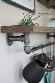 I've admired the look of iron plumbing pipe floating shelves since i first saw them done on fixer upper. Pin On Industrial Pipe Furniture