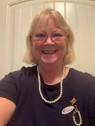 A metal Cardinal with magnets From my guys who I cared for. Each has passed.