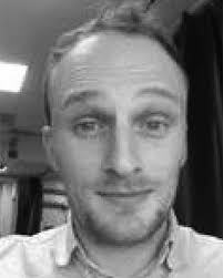 A Connected Array of Coherent Photoconductive Pulsed Sources to Generate mW  Average Power in the Submillimeter Wavelength Band