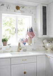 My sense is to just end it right at the edge,. Full Height Backsplash Design Ideas