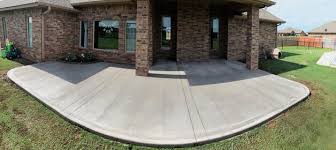 The multiple colors add depth to what could be a plain outdoor room. Concrete Patio And Porch Edmond Concrete