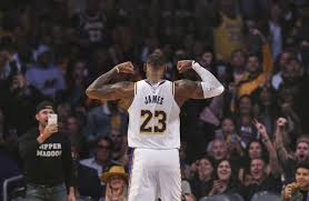 Lebron james is back in action. Lebron James Says He Will Keep His Name On Back Of Jersey Los Angeles Times